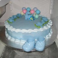 My 1St Baby Shower Cake Chocolate with Strawberry filling. Its really tasty.