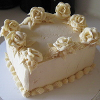 Buttercream Cake I created this buttercream cake complete with roses and shell borders for a client's wife's birthday. It came out looking pretty...