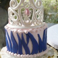 Princess Smash Cake Gumpaste crown with a ruffle skirt border. Buttercream with fondant stripes.