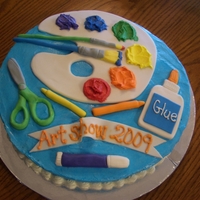 Art Show Cake Covered in buttercream with fondant art supplies.