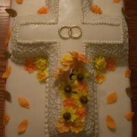 Cross Bridal Shower Cake Fondant covered cakes with gum paste flowers and leaves.