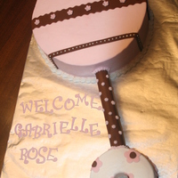 Baby Rattle This was for a post adoption baby shower. Both cakes are pink lemonade with lemon curd filling (thank you Amyscakesncandies for the recipe...