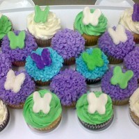 Butterfly Cupcakes Pretty Simple. Cupcakes with Buttercream frosting and Fondant butterflys (some coated in piping gel and dipped into sugar)