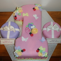 Twins 1St Birthday Birthday Cake for Twin Girls, each with there own little cake.