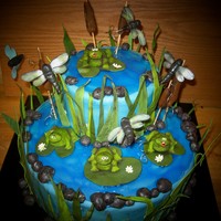Frog Pond Gumpaste frogs, dragonflys, and lily pads.