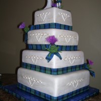 Scottish Wedding Cake The top tier is vanilla bean with white chocolate ganache, the second layer is lemon with fresh lemon curd, the third layer is huckleberry...