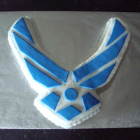 Air Force Logo Cake This cake was hand carved and iced with buttercream with blue fondant accents. Icing those corners were very difficult!