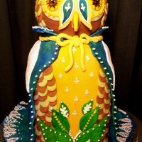 Majestic Owl :d I made this nolvelty/sculpted cake for my Advanced Patisserie class. I think I'm going to go over it one more time with the airbrush...