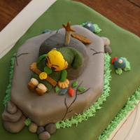 Sword & The Stone I was asked to do a cake for my brother in-law, who is a HUGE Zelda fan. This is my first character cake.