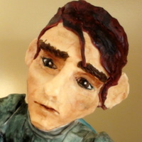 Star Wars Clonewars For our son's 7th birthday. Arms, torso and legs are foam covered fondant. Head is A TON of moldeling chocolate.