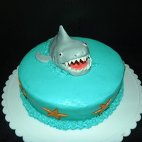 Yay! Shark Week Starts Tomorrow, Aug 1St! Chocolate peppermint cake with buttercream icing. Shark and starfish are made from fondant/gumpaste.