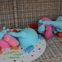 Ikea Critters The mother who ordered this cake brought me her daughter's favorite toys and asked me to copy them. The bodies are cake with ganache...