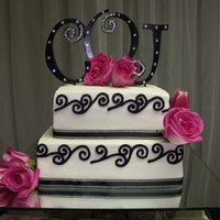 Wedding Cake Topper This was a wedding cake topper. The bride had petit fours on a tiered platter and this was the top. Traditional white cake w/ white BC....