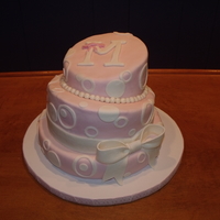 Pretty In Pink This was my first attempt at a topsy turvy cake and I was surprised at how easy it was! French vanilla cake covered in MMF. All accents are...