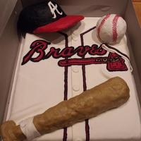 Atlanta Braves The cake is a pineapple upside down cake with the pineapples as the middle. Hat, ball and bat are cereal treats. Everything was covered in...