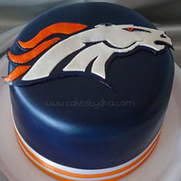 Bronco's Cake This cake was made for an avid Bronco's fan. Logo was hand-carved out of gumpaste.