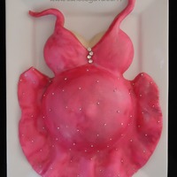 Baby Belly With A Little Extra Bling This is a belly cake that I made for a client that is having a baby girl. She is extra outgoing, and has a super fun personality, so I...