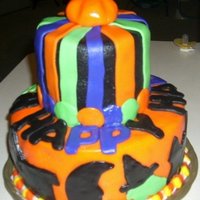 Halloween Cake My 3Rd Cake This was fun. Mostly made of marshmellow fondant. Chocolate with ganache on the bottom and red velvet on top. My 3rd cake. I also had the...