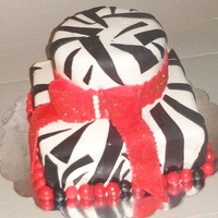 Zebra Print Was asked to do a cake with the color contrast of black and red ,perfect opportunity to try the zebra print..TFL