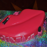 Hot Lips chocolate cake with chocolate ganache and fondant.all accents fondant, rkt and modelling chocolate.