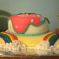 Somedora Over The Rainbow I am a little scared of this cake. It looks like the 80's ate Dora and spit her back out. I hope the little girl likes it. :/ And...
