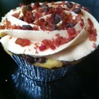 The King! A tribute to Elvis and his favorite sandwich... Chocolate and banana marbled cake with mini chocolate chips, topped with peanut butter...