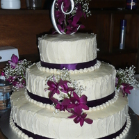 My First Wedding Cake This is my frist try at a wedding cake I made for a friend of my daughter-in-law. The top and bottom tiers are white cake with strawberry...