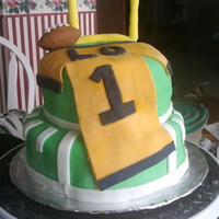 Football Birthday Cake! This is my second customer cake, and third time using fondant. It's all white cake with all fondant decorations. It was a last-minute...