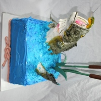 Bass Cake The fish was made of RKT covered in fondant. Everything but the wire in the fishing lure is is edible.