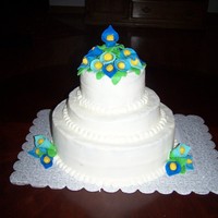 Wedding Cake with handmade calla lily's on top and the sides