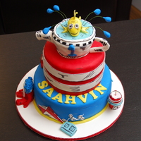 Cat In The Hat Chocolate cake with vanilla buttercream. The Fish/bowl is made out of cake/fondant and was the smash cake for the birthday boy
