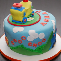 Train Cake 4 layer chocolate cake with chocolate hazelnut buttercream. The train on top is made out of cake and was the smash cake for the birthday...
