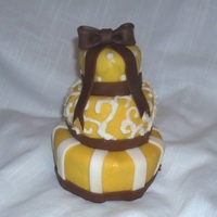 6" Tall 3-Tier Cake 6" tall, a design cake I made for a bridal shower client. gold and chocolate fondant.