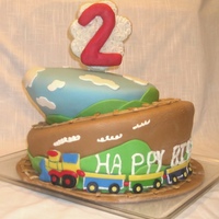 All Aboard The Birthday Express! 2nd Birthday Train going up a mountain topsy-turvy cake with 2 on a cloud hand decorated sugar cookie topper