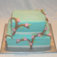 Rectangle Branches And Flowers Bridal Shower Cake Small (served 16) 2-tier rectangular Bridal shower cake, covered in pastel teal fondant and decorated with vining branches, little green...