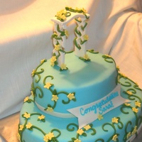 Bridal Arbor Oval cakes, gumpaste bridal arbor, with climbing flowering vines and a banner, "Congratulations Sara"