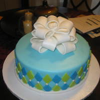 Geometric Designs Cake my first cake with shape cutter and bow.