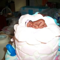 African Theme Shower Cake Cake for my cousin's baby shower. She is adopting a boy and girl from Ethiopia. WASC with raspberry filling, buttercream, and MMF.