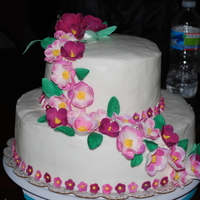 Tropical Flowers My daughter and I made this cake for my brother and his wife's 11th anniversary. This was our first tiered cake. The cake is butter...