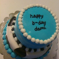 Happy Birthday Demi Strawberry and Lemon swirl cake with a whipped lemon filling, All fondant with Cream cheese icing accents.