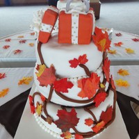 Fall Leaves Engagement Cake I made this cake for my sister's engagement party. 2 tiers coconut cake with pineapple cream filling and 2 tiers are red velvet cake...
