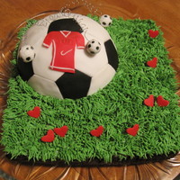 Soccer Field made this cake for my 9 years old son who loves soccer,the hearts scattered over the field represent his age
