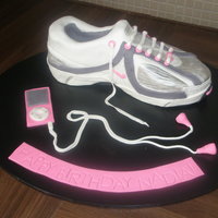 Nike Running Shoe/sneaker This is the first 3d shoe cake I have made. Although a challenge I was quite happy with the result. I know now how to improve next time!!
