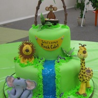 Jungle Baby Shower This cake was for a jungle themed baby shower. The palm trees are wired, and all of the creatures are made of gumpaste.