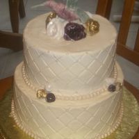 Hummingbird This was for a 90 year old woman who loves hummingbirds. They wanted something elegant with a hummingbird on top. Buttercream icing....