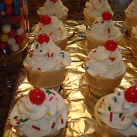 Cupcake Cones Chocolate Cake cones with Buttercream Icing, sprinkles and a cherry on top!