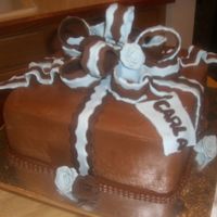 Blue_Bow.jpg Buttercream frosting, fondant bow and roses