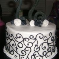 Sweet 16 The birthday girl loves black and white, so I made this cake for her. Butter cream frosting with fondant roses and the 16 is made out of...