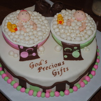 Babies In The Tub this cake was made for 2 ladies having a baby shower together. one was having a boy and the other a girl. the tubs are cake and it's...