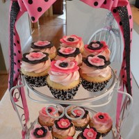 Pink And Black Cupcakes Cupcakes with fondant flowers for my daughter's 17th birthday.